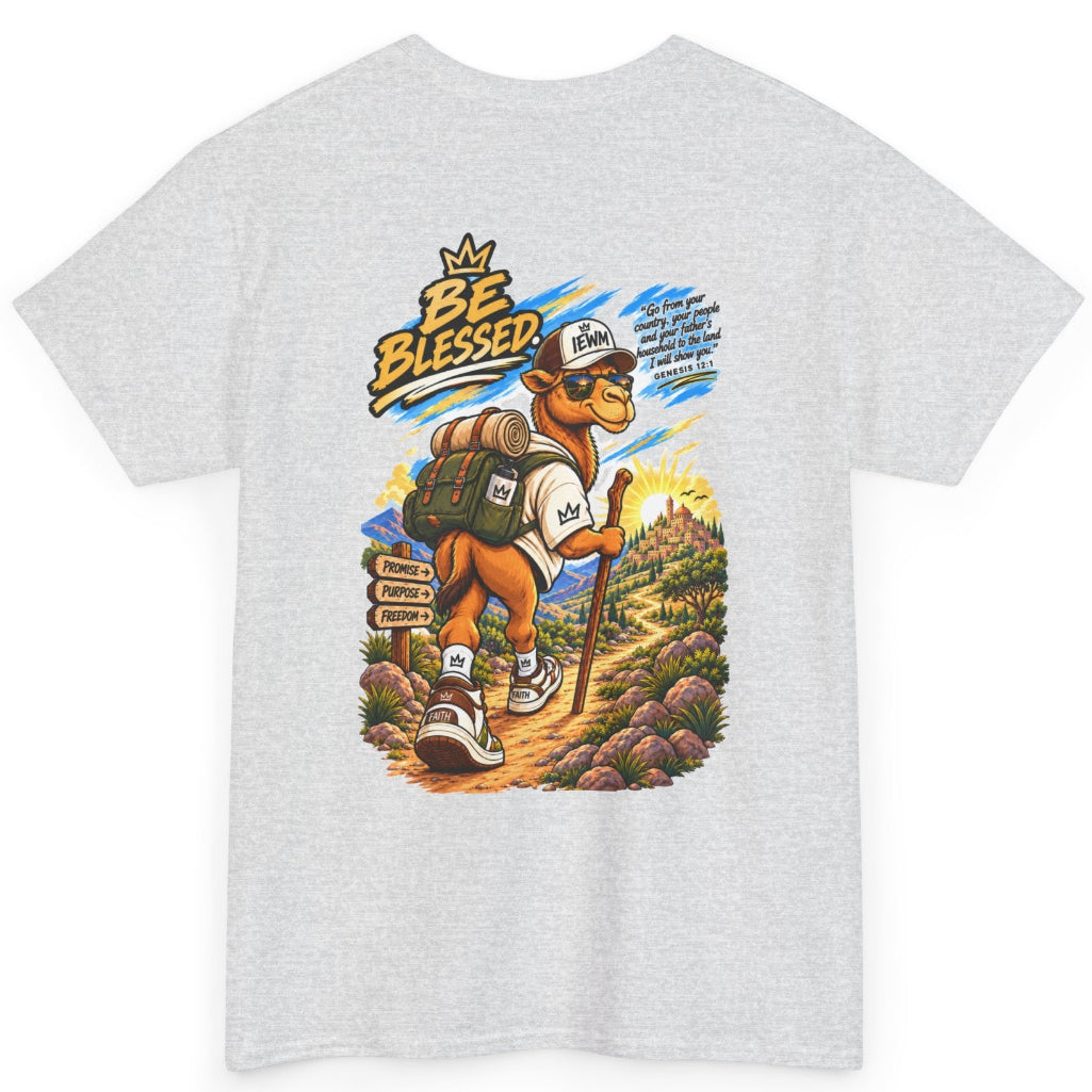 A light heather gray crewneck t-shirt featuring a large, colorful graphic print on the front. The graphic depicts a cartoon walking camel wearing a backpack and a baseball cap with the text 'BE BLESSED'