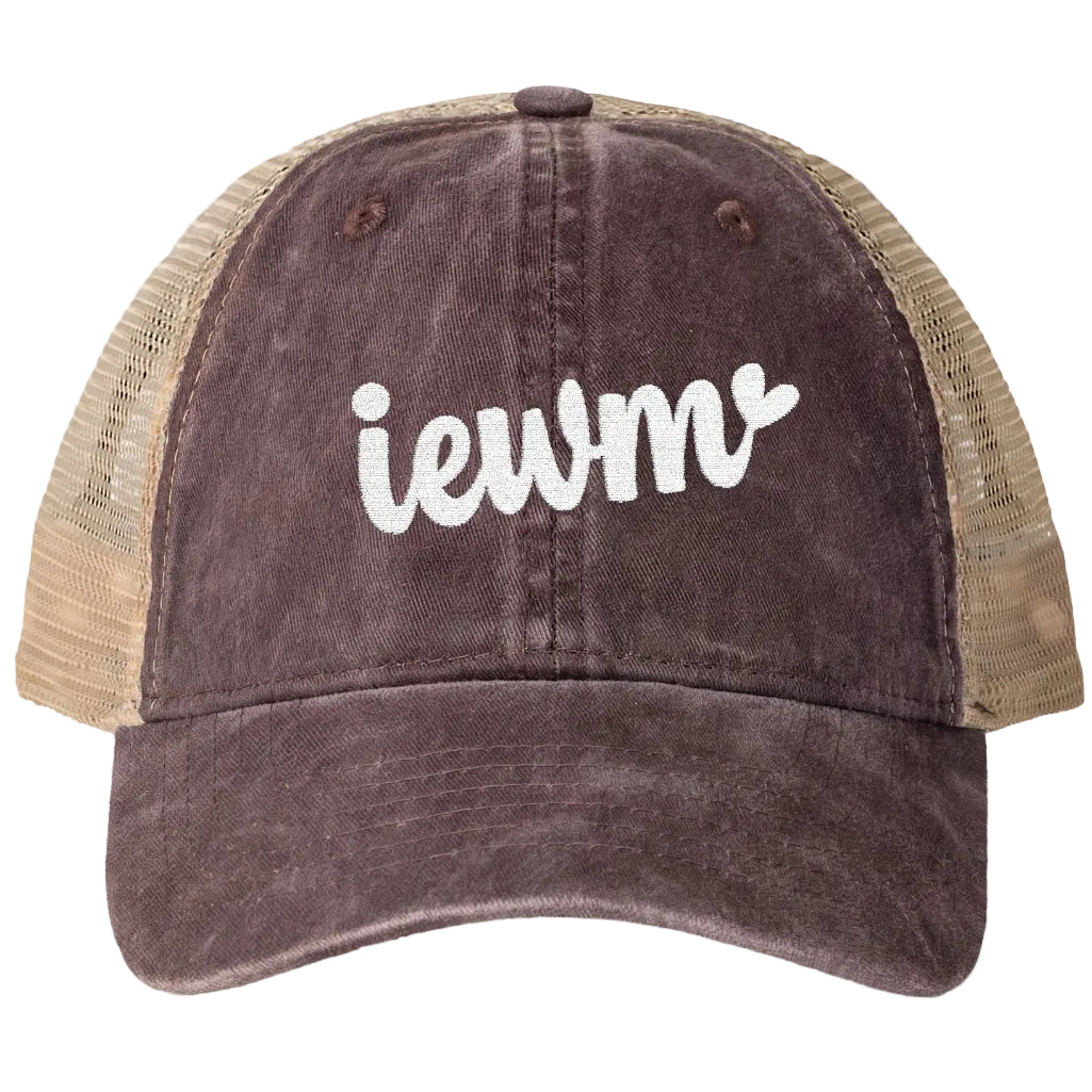 A trucker-style baseball cap with a dark brown washed front panel and brim, tan mesh side panels, and white embroidered text reading 'iewm' on the front, shown on a clean white background.
