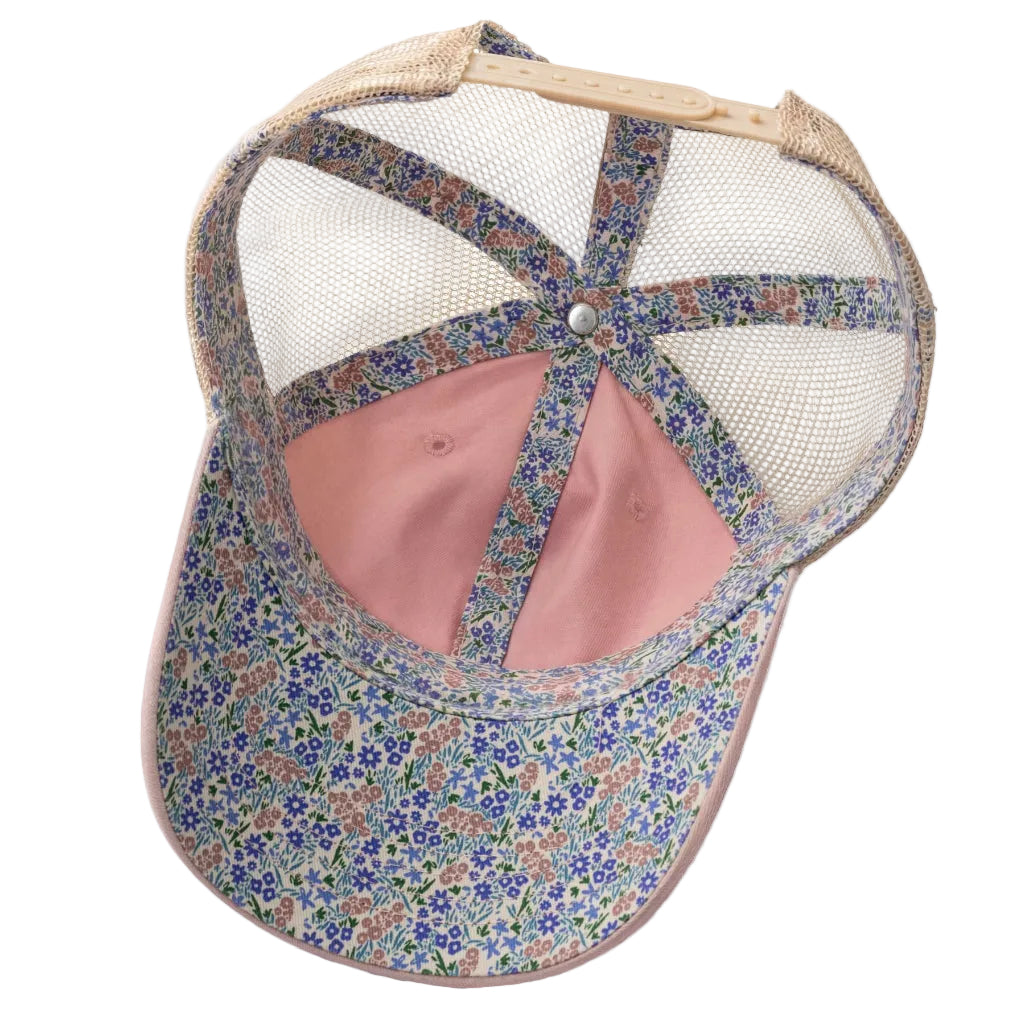 Floral-patterned cap with mesh back on a white background