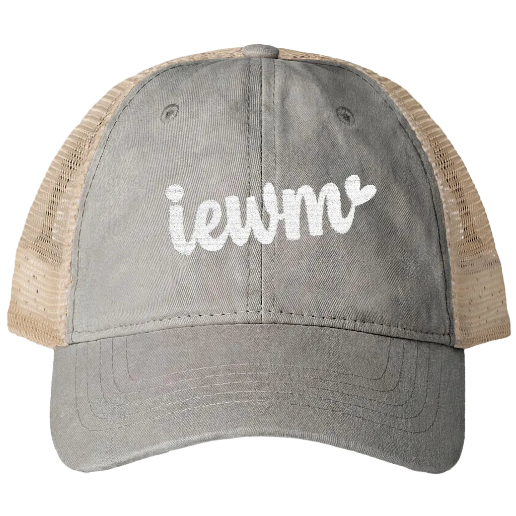A gray washed trucker hat with beige mesh back panels and a white embroidered 'iewm' logo on the front, shown against a plain white background.