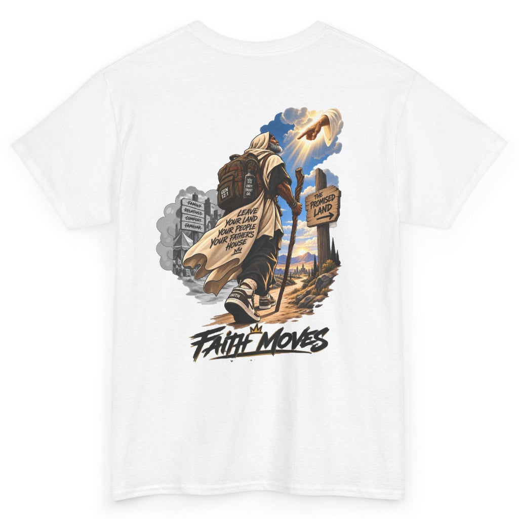 A white short-sleeve crewneck t-shirt featuring a large graphic print on the front. The graphic depicts a person carrying a large brown staff, walking through a desert landscape with a sign that reads 'FAITH MOVES' below it, set against a clean white background.