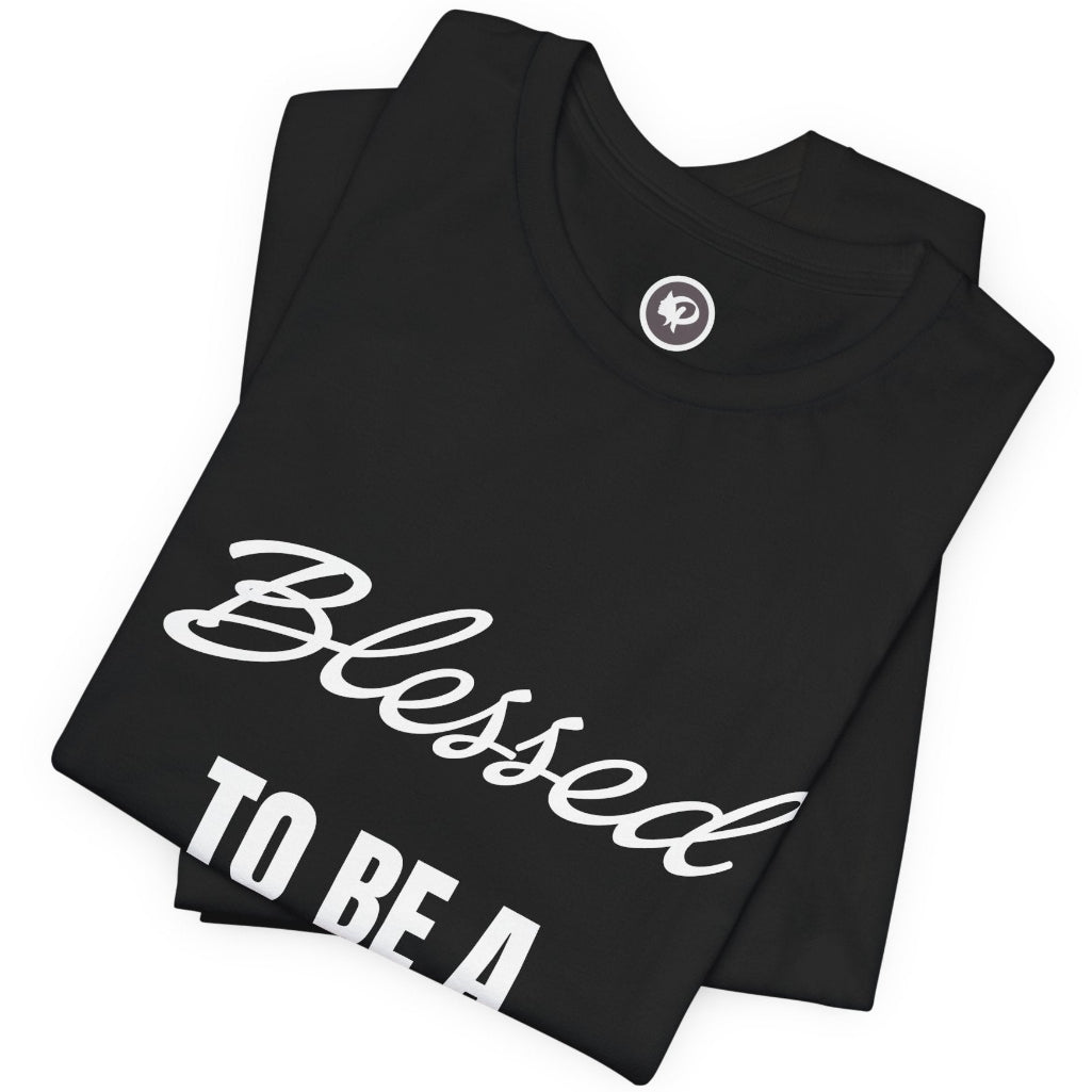 A folded black t-shirt with white text reading 'Blessed TO BE A Blessing' on a plain white background.