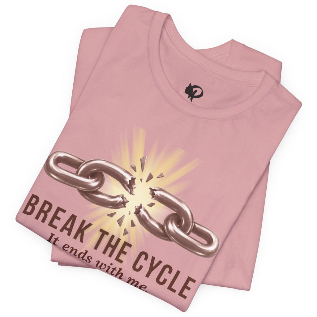 A folded orchid pink t-shirt with a graphic of a broken metallic chain and the text 'BREAK THE CYCLE It ends with me' on a white background.