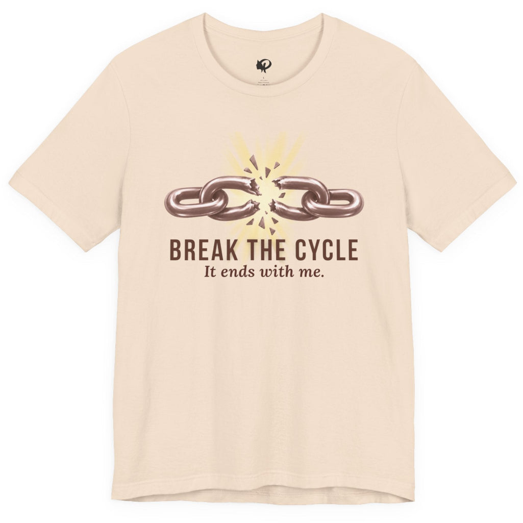 A light beige crewneck t-shirt with a graphic of a broken chain and the text 'BREAK THE CYCLE It ends with me.' printed on the front, displayed on a clean white background.