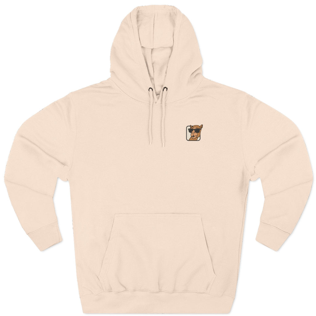 A pale pink pullover hoodie with a small camel graphic on the left chest, shown on a clean white background.