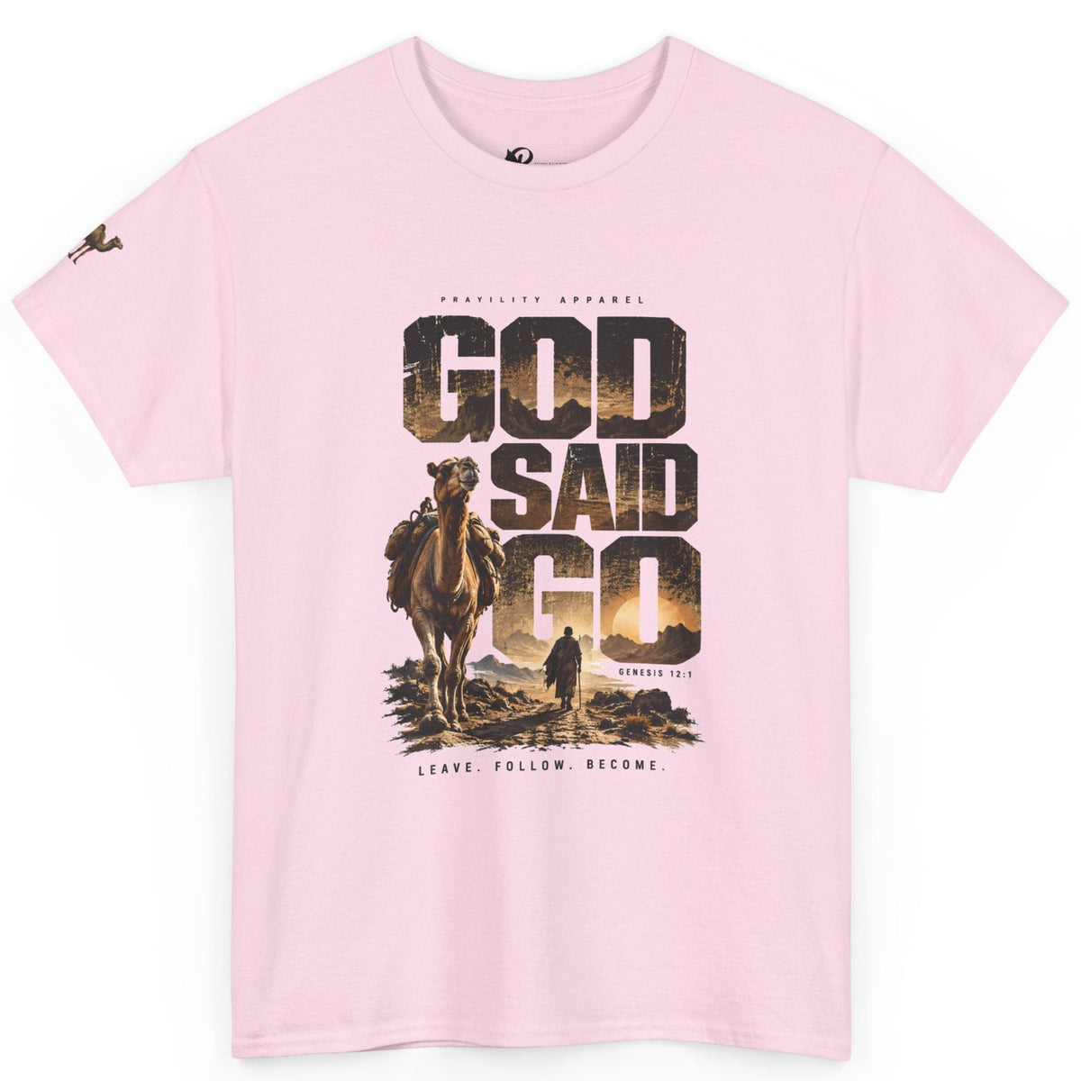 A light pink short-sleeve t-shirt with a graphic print on the front featuring a camel, a person, and the text 'GOD SAID GO' in a desert landscape design.