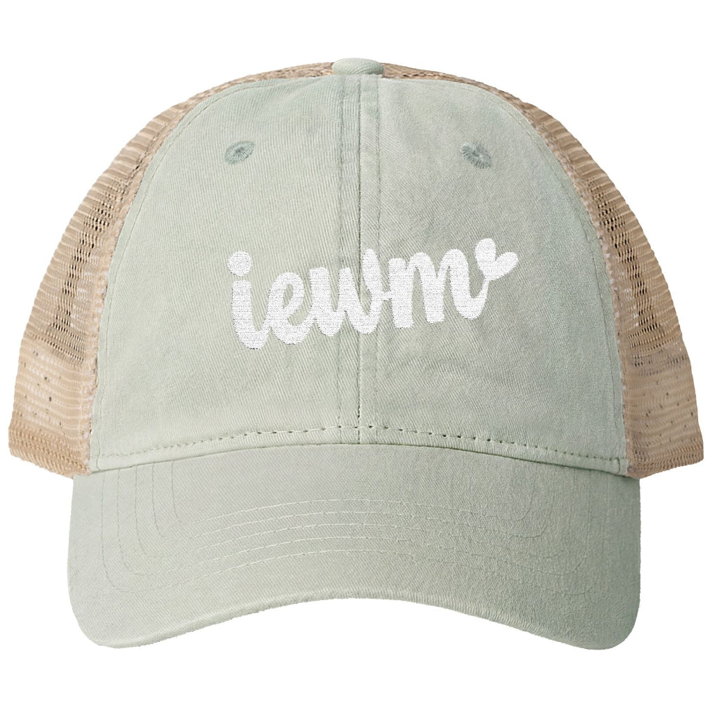 A trucker-style baseball cap with a sage green front panel and brim, tan mesh back panels, and white embroidered text reading 'iewm' on the front, shown against a plain white background.