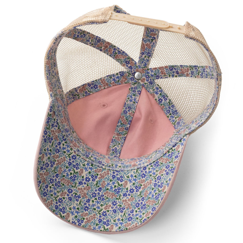 Floral-patterned cap with mesh back on a white background